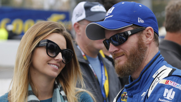 Dale Earnhardt jnr with his wife Amy Reimann. They have survived a plan crash in the US.