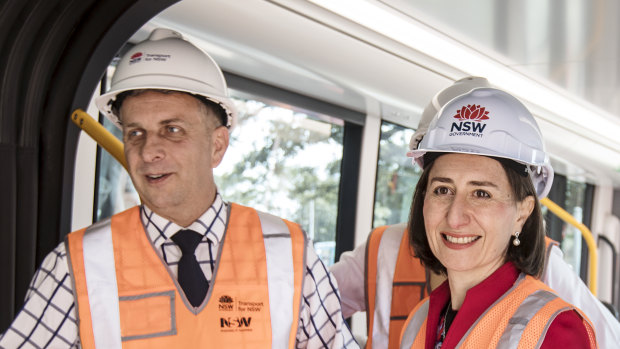 Gladys the builder: Ms Berejiklian with Infrastructure Minister Andrew Constance.
