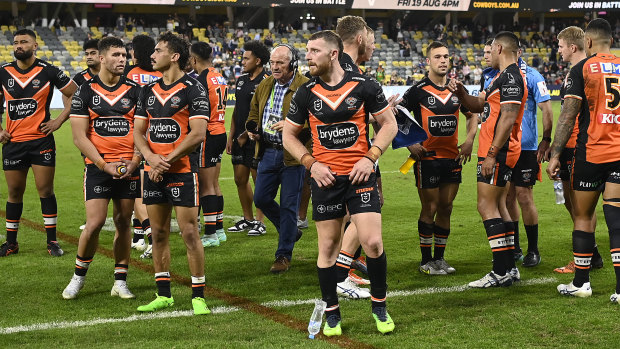 The Wests Tigers after their controversial last-second loss to the Cowboys.
