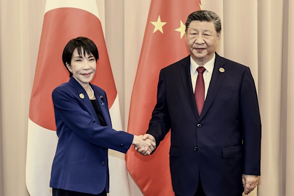 Takaichi with China’s President Xi Jinping on the sidelines of the APEC economic leaders’ meeting in Gyeongju, South Korea in October. 