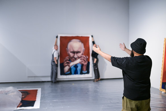 Chinese-Australian artist Badiucao prepares for the exhibition at Ujazdowski Castle’s Centre for Contemporary Art in Warsaw. 