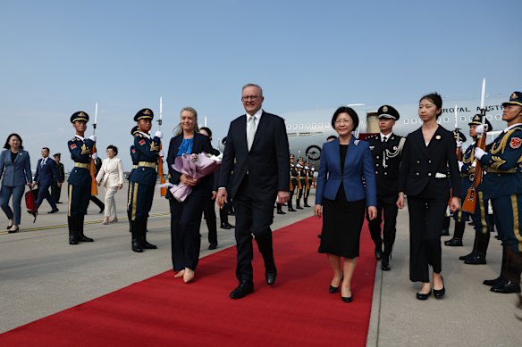 Prime Minister Anthony Albanese and  Jodie Haydon arrive in Beijing on Monday night.