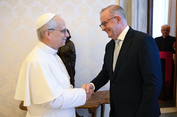 Pope Leo greets Prime Minister Anthony Albanese during a private meeting at the Vatican.