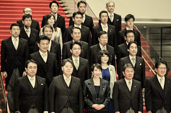 Takaichi with her new cabinet in October, which includes two other women: Satsuki Katayama, second row, and Kimi Onada, fourth row.  
