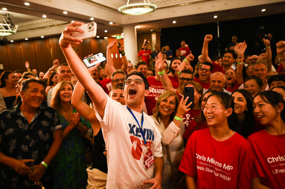 Labor supporters react to positive results in the NSW state election at Chris Minns’ Labor Party reception at the Novotel Hotel in Brighton-Le-Sands.