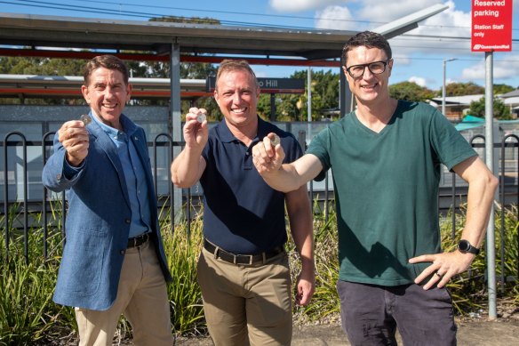 Treasurer Cameron Dick, Premier Steven Miles and Transport Minister Bart Mellish announce the six-month 50-cent public transport fares, beginning in August.
