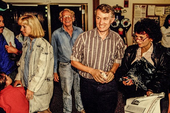British microbiologist Richard J. Roberts (in the striped shirt) celebrates sharing the Nobel Prize for physiology or medicine in 1993.