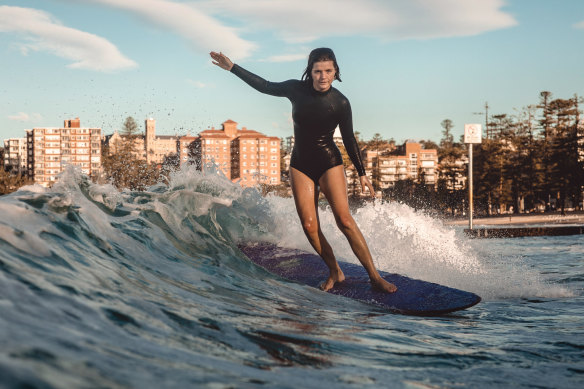 Lucy Small surfing in Manly in May last year.