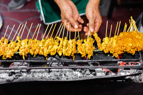 Charcoal-cooked pork satay skewers on a tour of Bangkok’s back-alley gems.