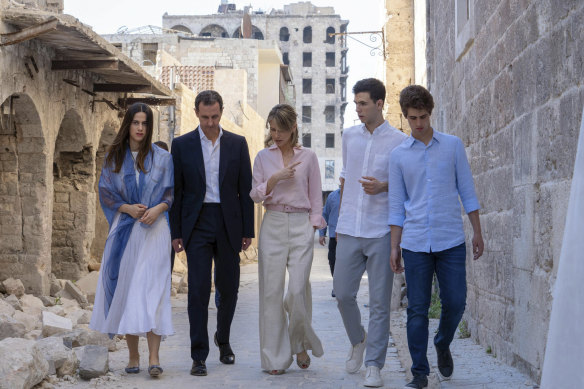  Bashar al-Assad and his wife Asma (centre) with their children (from left) Zein, Hafez and Karim outside the Great Mosque of Aleppo in 2022.