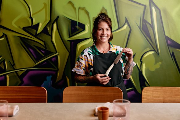 Despite being pictured here with her favourite Japanese knife, when facing negative feedback, Joy chef-owner Sarah Baldwin says she always tries to “kill them with kindness”.