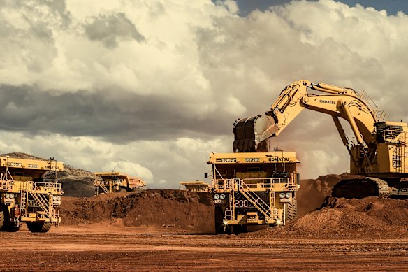 Autonomous haulage trucks at an iron ore mine in Western Australia.