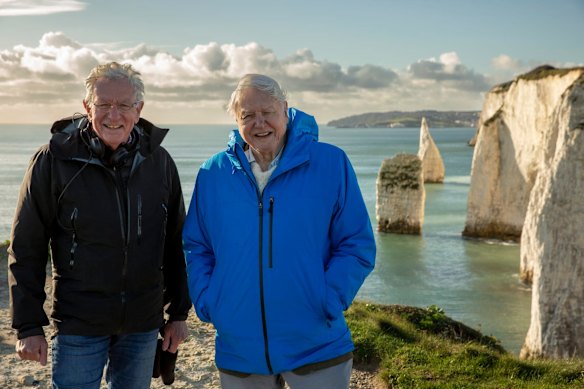 Co-director Keith Scholey and David Attenborough (right) on location while filming Ocean.