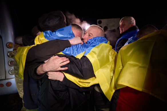 Ukrainian soldiers celebrate their freedom after a prisoner exchange with Russia - the largest since the start of the war.