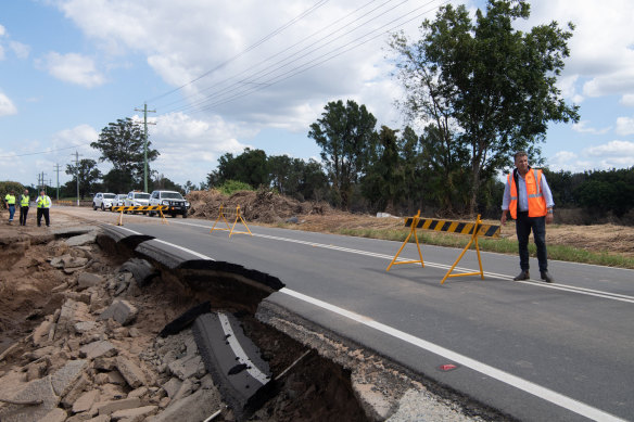 Transport Minister Andrew Constance inspects a collapsed section of Freemans Reach Road just north of Windsor in Sydney’s north-west.