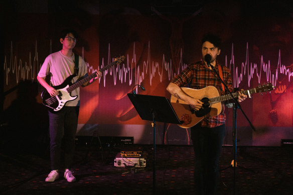 Musicians perform inside the City on a Hill church in Melbourne.