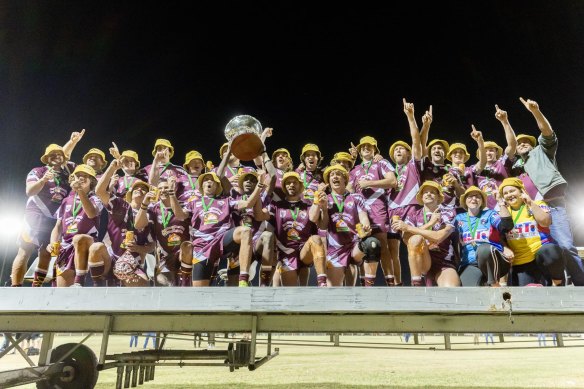 The Barcaldine Sandgoannas celebrate their unlikely grand final win.