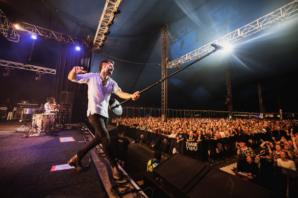 Felix Riebl works the Bluesfest crowd.