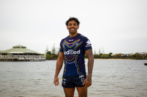 Melbourne Storm winger Josh Addo-Carr models the club's NRL Indigenous Round jersey for 2020. 