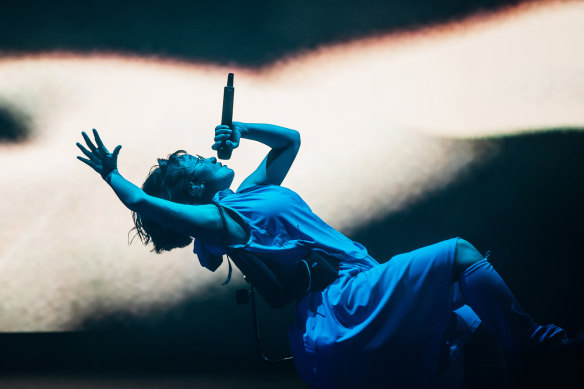 Yaeji leans back on her chair during Fever.