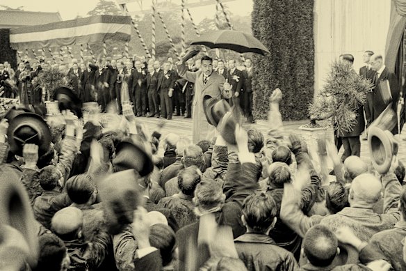Emperor Hirohito appears in Tokyo in May 1947 for celebrations over Japan’s new constitution, under which his powers were reduced to ceremonial.