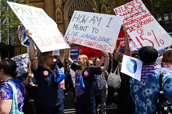 Striking nurses march to NSW parliament in September. 
