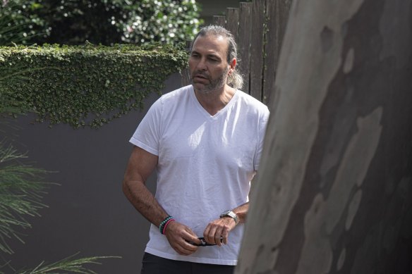 Lehrmann’s friend Paul Farrell, seen at the North Sydney property.