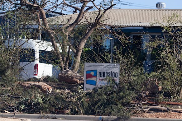 Community members are banding together to clear fallen trees and other debris caused by cyclone Narelle. 