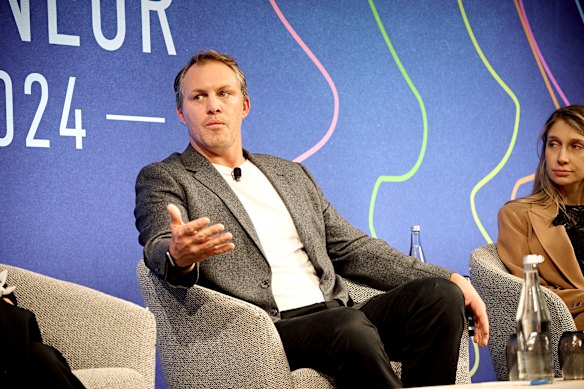 Stephen Hoiles talking at an AFR entreprenuer summit in 2024. Hoiles also owns a health ands well-being business.