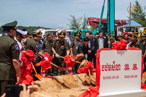 Cambodian and Chinese officials take part in a groundbreaking ceremony at the Ream Naval Base on June 8.