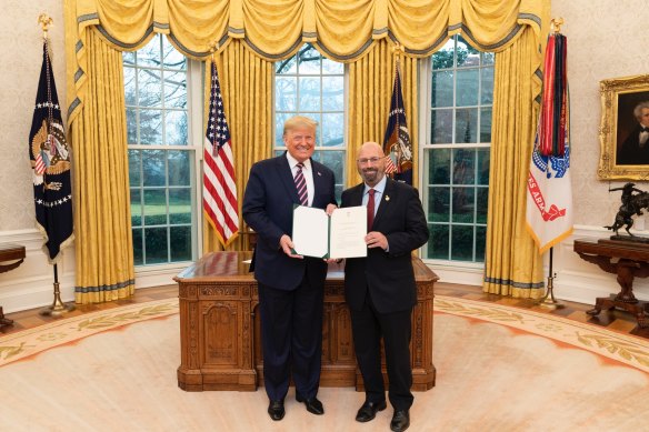 Arthur Sinodinos presents his credentials as Australian ambassador to Donald Trump in 2020. 