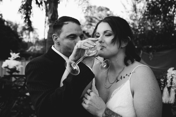 Natasha Bland and Travis Heise on their wedding day in May.