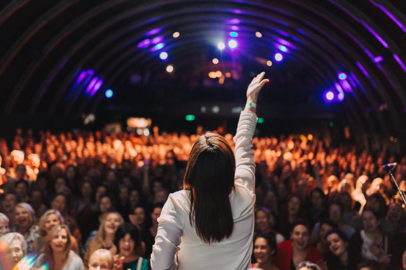 Jorgensen leads Pub Choir at the Triffid in her hometown of Brisbane in 2018. 