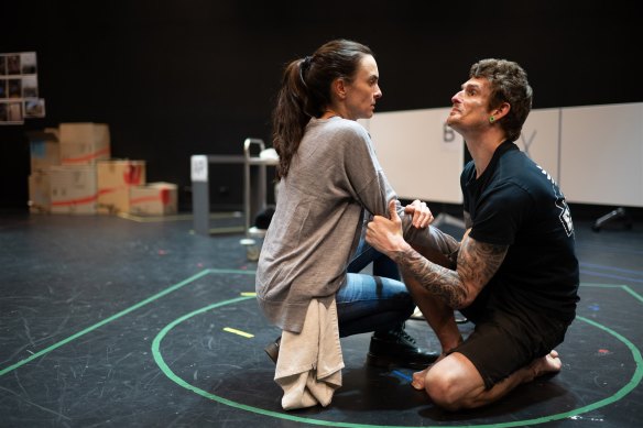 Zoe de Plevitz (Jess) and Dan Daw (John) rehearse Cost of Living at Queensland Theatre. The script specifies that John be played by a disabled actor.