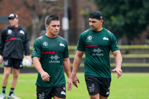 Walker chats to new recruit Kodi Nikorima at training on Monday.