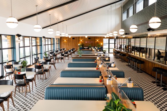 The diner is classic Americana cool, with Cadillac banquette seating.