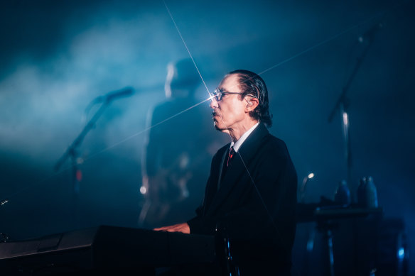 Ron Mael sits impassively at the keyboard, rarely breaking character.