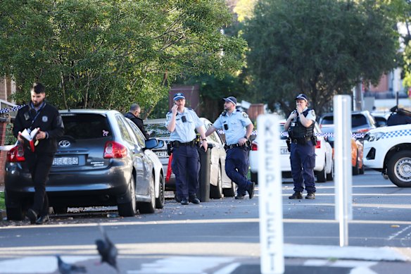 Police have cordoned off Harrow Road in Auburn.