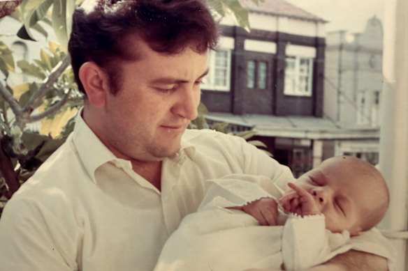 David Haselhurst, holding his newborn son Patrick.