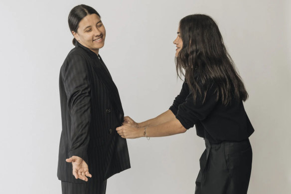 The Matildas’ Sam Kerr, left, and Beare
Park designer Gabriella Pereira. Kerr wears the off-field uniform created for the team.