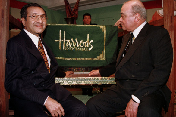 Mohamed al-Fayed (right) with then Malaysian prime minister Mahathir Mohamad in 1998. Fayed bought Harrods, along with other high-profile British brands.