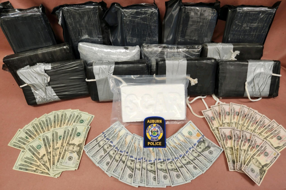The intercepted fentanyl, worth an estimated $US3 million, and cash seized by Maine police. 