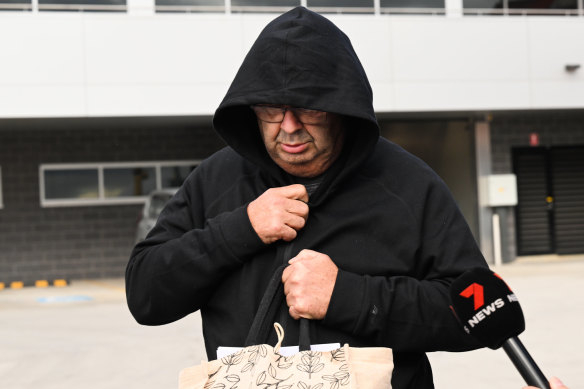 Brett Button leaves Cessnock police station on Tuesday.