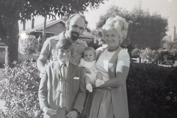 Chris Bowen as a baby with his brother Paul, father Ross and mother Christine.