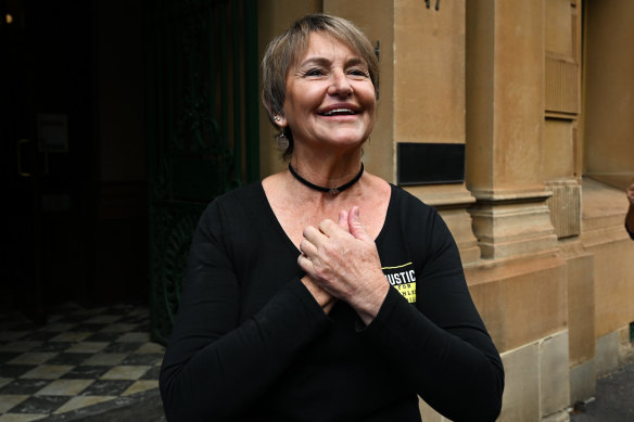 Kathleen Folbigg’s childhood friend Tracy Chapman reacts with joy outside the inquiry on Wednesday.