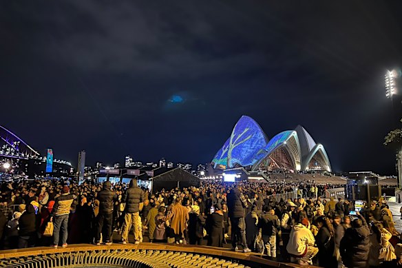 Crowds await a drone show that was later cancelled at the 2024 festival.