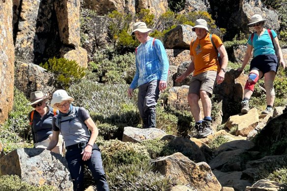 The author and friends descend from the mountain – Tasmania’s highest peak, Mount Ossa.