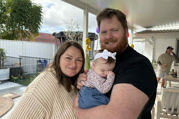 Daniel Handley, 34, with his wife Jessica, 37, and their daughter Bronte. Daniel describes himself as a father “desperately trying to get into the market”. 