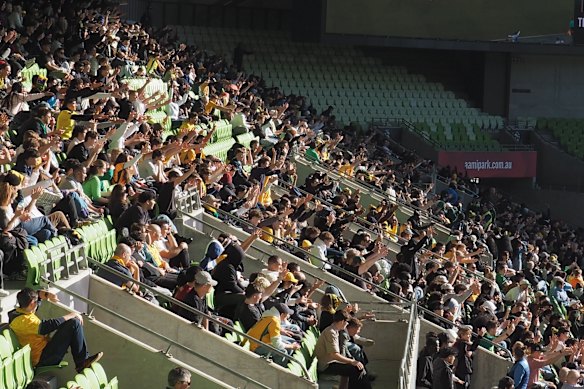 Several thousand fans cheered on the Socceroos at the AAMi Park watch party.