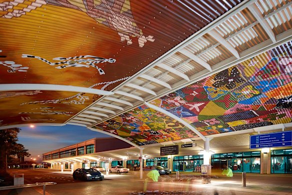 Top-End aesthetic: Indigenous art adorns the departures entrance.